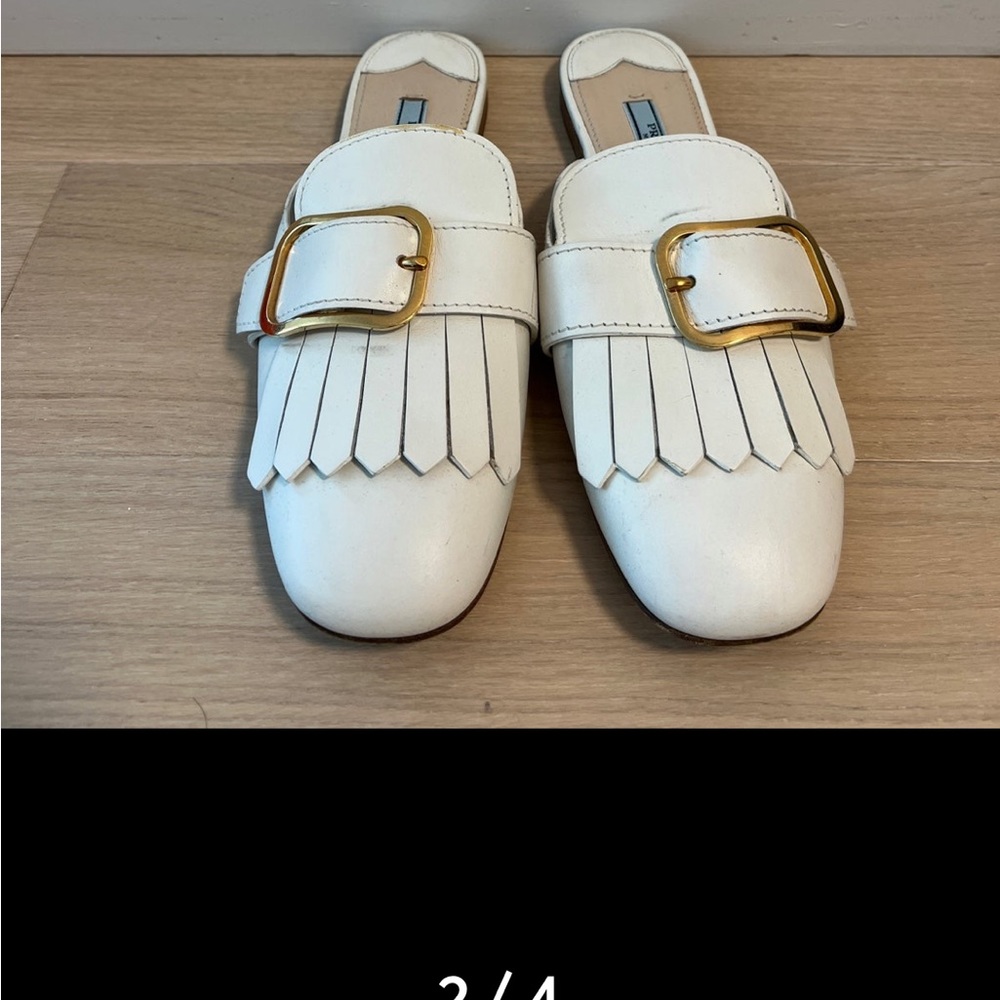 Prada Leather Buckle Kiltie Mule Flat